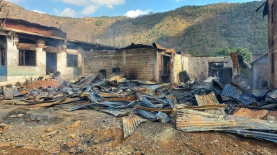 Charred remains of a building following a violent clash between the Tangkhul Naga and Kuki tribes at Litan village, in Ukhrul, Manipur, India, February 10, 2026. 