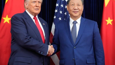 US President Donald Trump (left) and Chinese President Xi Jinping before their meeting at Gimhae International Airport in Busan, South Korea, October 30, 2025.