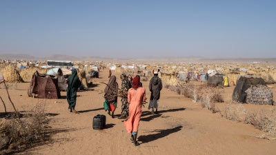 Displaced women and girls walk through the vast IDP site in Tawila, Sudan, February 23rd, 2026.