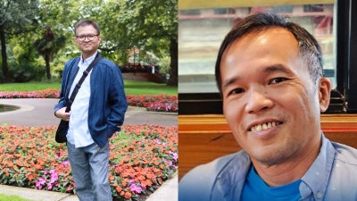 Nguyen Duc Thuan (left) and Tran Hiep.