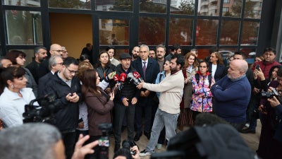 Halk TV general news coordinator Serhan Asker gives an interview to media after the government takeover of the channel, a police raid on the premises, and the announcement of an arrest warrant against its owner and 16 others. Halk TV, Istanbul, October 14, 2026.