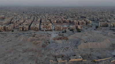 An aerial view of a damaged area of Damascus where the debris from collapsed buildings is being turned into sand, gravel, and bricks to reuse as construction materials to restore areas affected by Syria’s civil war, November 2, 2025. 