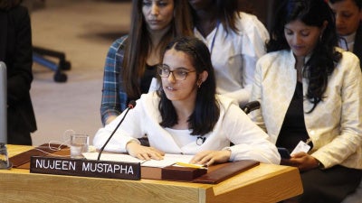 A young woman speaking at the UN Security Council