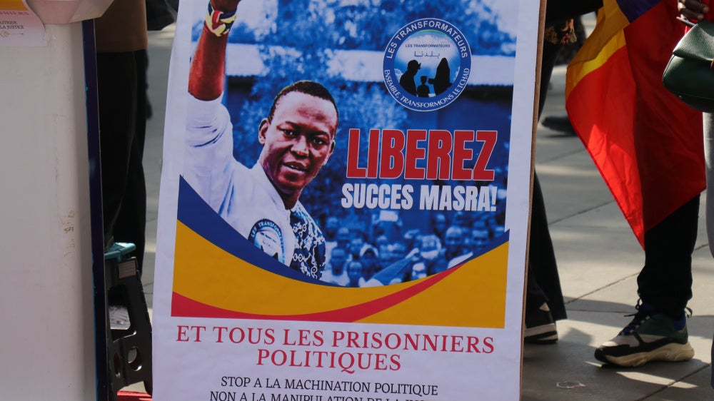 A poster calling for the release of Succes Masra at a protest in Paris.