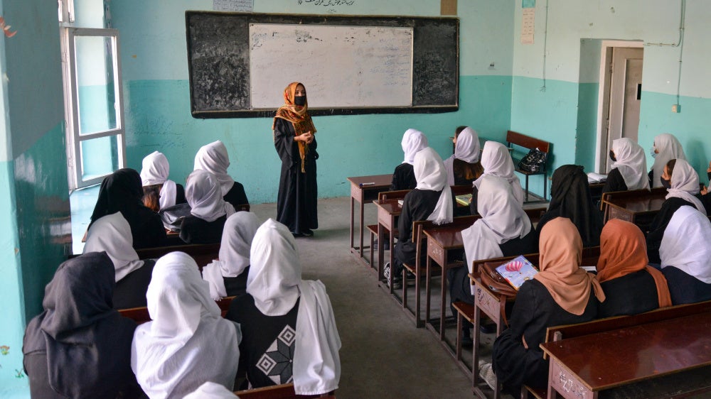 Afghan girls attend a class after their school reopened in Kabul on March 23, 2022. Hours later, the Taliban ordered girls' secondary schools shut.