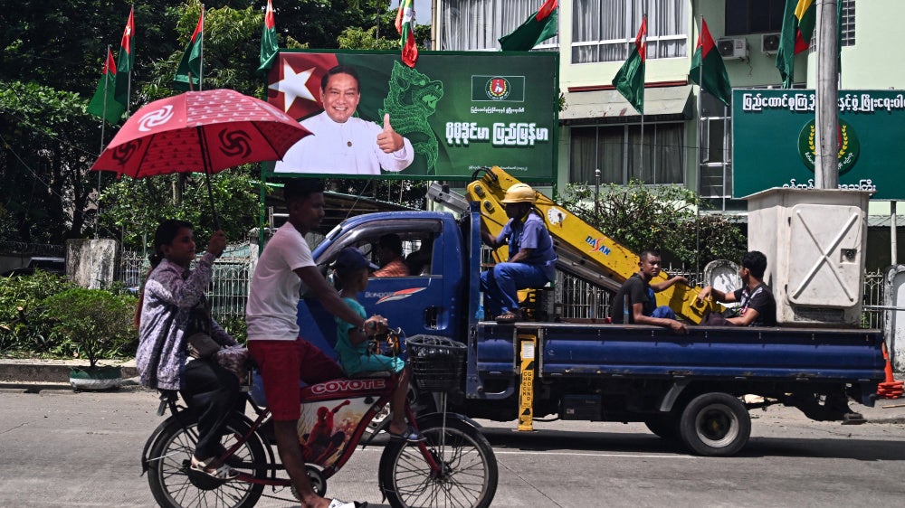 A billboard of the chairman of the Myanmar military-backed Union Solidarity and Development Party ahead of the start of the campaign period for the junta’s elections in Yangon, October 27, 2025. 