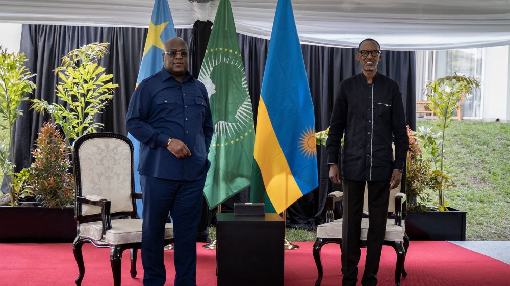 Democratic Republic of Congo President Felix Tshisekedi (L) and Rwandan President Paul Kagame at the Serena Hotel in Rubavu, Rwanda, on June 25, 2021. 