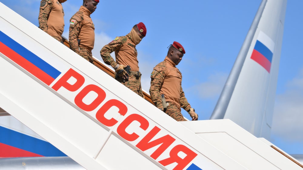 Burkina Faso president gets off plane at Moscow airport.