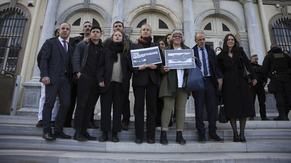 Protesters, lawyers, and aid workers outside a court in Mytilene, on the northeastern Aegean island of Lesbos, Greece, January 13, 2023.