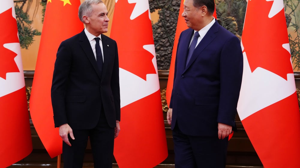 Canadian Prime Minister Mark Carney, left, meets with Chinese President Xi Jinping