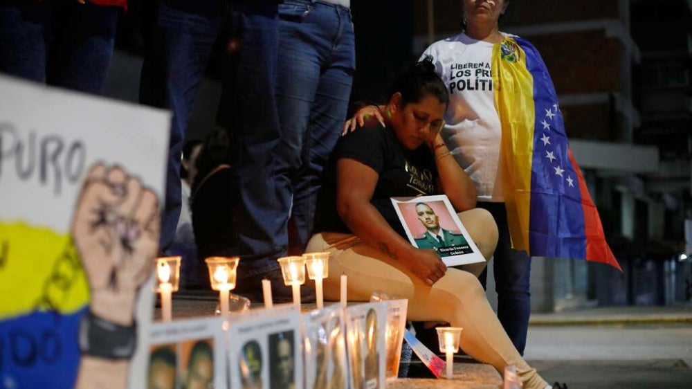 Relatives of detainees held for political reasons wait outside El Helicoide, headquarters of Venezuela's intelligence service and a detention center, after the National Assembly approved an amnesty bill in Caracas, Venezuela, February 19, 2026.