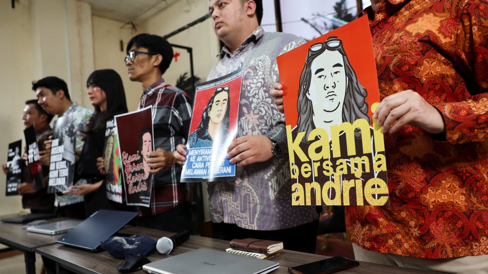 Advocacy for Democracy Team (TAUD) members show solidarity with Andrie Yunus, a rights who suffered burns in an acid attack in Jakarta, Indonesia, March 16, 2026.