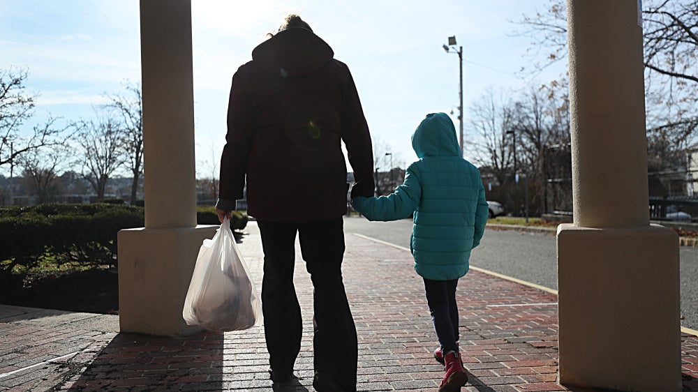 A woman and her daughter in Revere, Massachusetts, US, December 11, 2020.