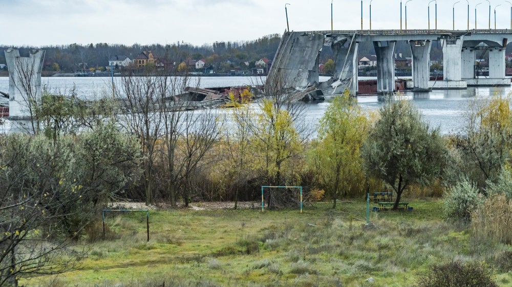 The Antonovsky bridge destroyed by the Russian army with explosives in its retreat of Kherson, Ukraine, November 16, 2022.