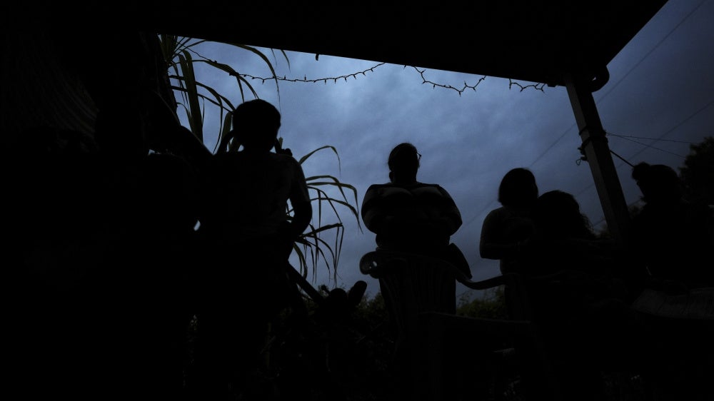 In Homestead, Florida, women and their children listen to an explanation of their legal rights and strategies for preparing their families if a parent is detained or deported,  January 17, 2025.