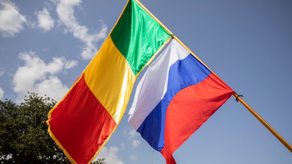 Malian and Russian flags fly side-by-side