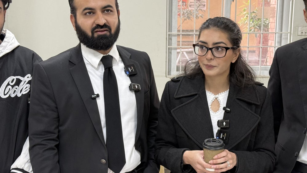 Human rights lawyers Imaan Mazari (right) and Hadi Ali Chattha, during a court hearing in Islamabad, Pakistan, December 5, 2025. 