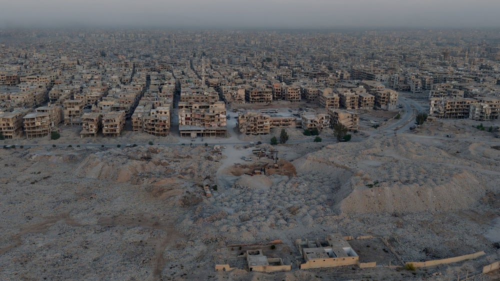 An aerial view of a damaged area of Damascus where the debris from collapsed buildings is being turned into sand, gravel, and bricks to reuse as construction materials to restore areas affected by Syria’s civil war, November 2, 2025. 