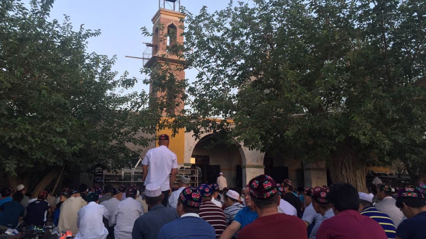 A mosque in Kumul, Xinjiang, China, during Eid Al-fitr prayer, July 2016.