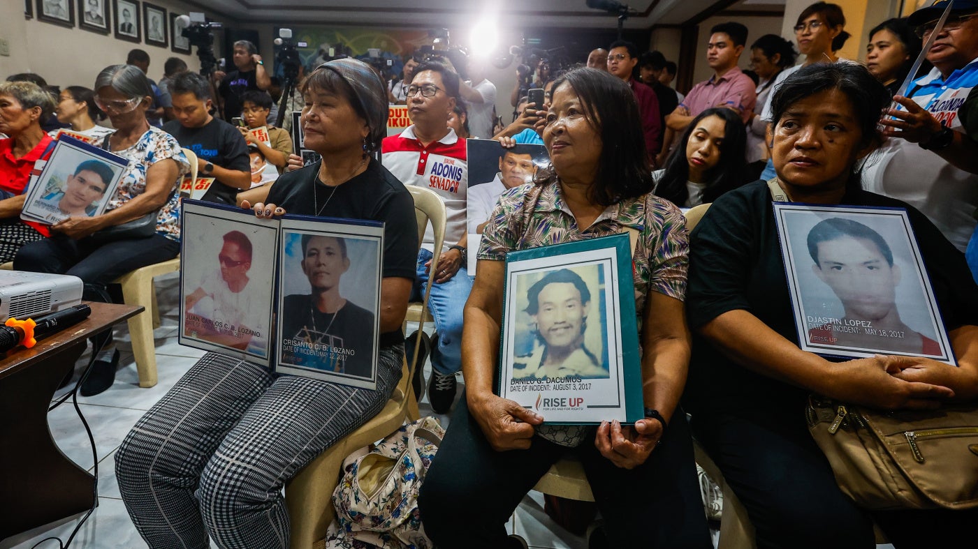 Family members of “drug war” victims watch the livestream of former Philippine President Rodrigo Duterte’s initial appearance at the International Criminal Court for alleged crimes against humanity, in Quezon City, Philippines, March 14, 2025. 