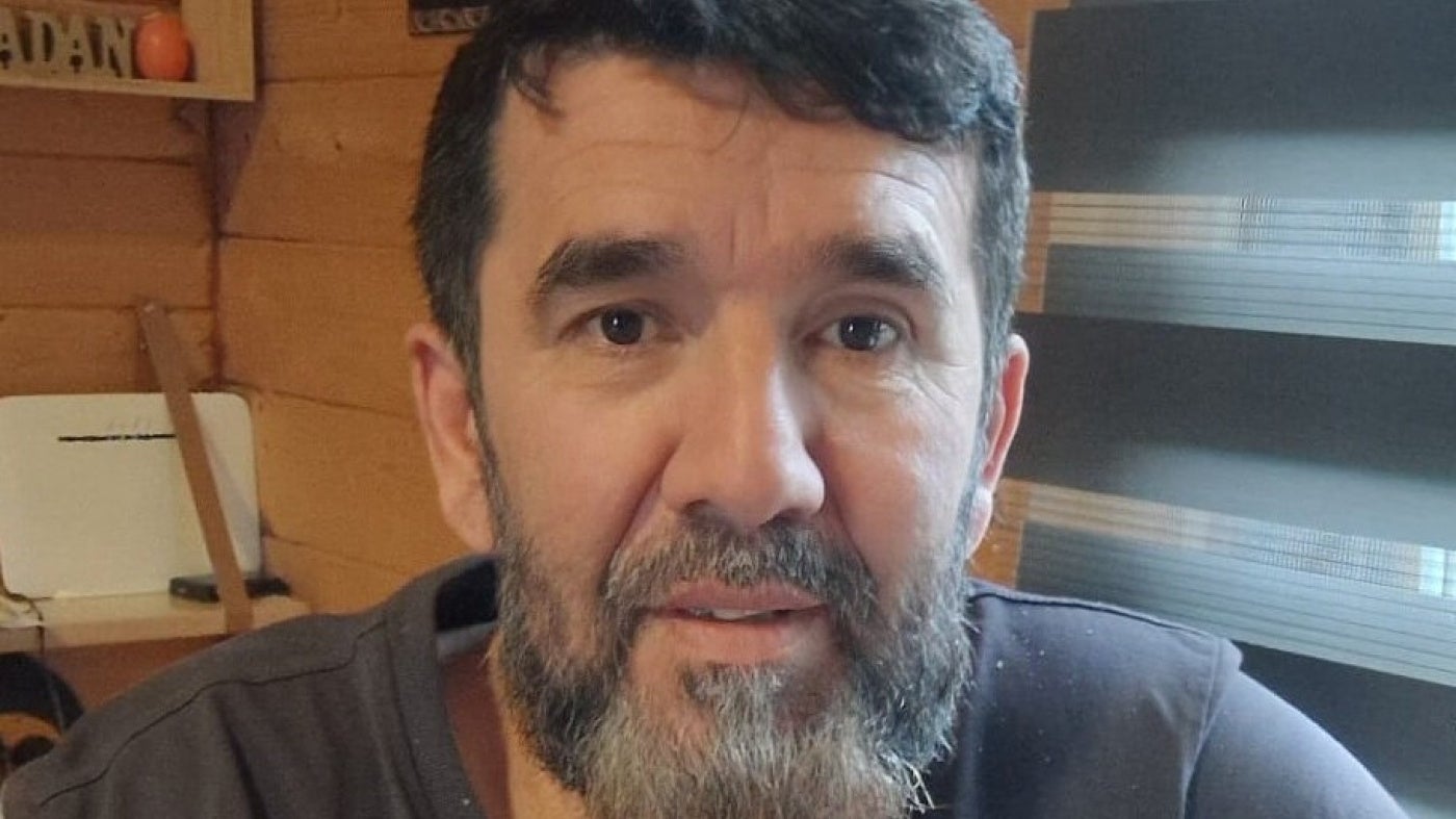 man smiling in a photo
