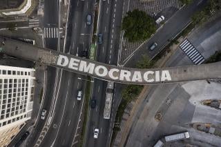 The word “democracy” on a pedestrian bridge in São Paulo, Brazil, October 26, 2022.