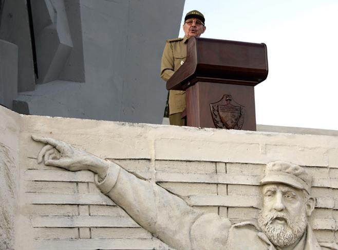 Raúl Castro speaks at a rally in Camagüey, Cuba, in July 2007, a year after being handed power by his ailing brother, Fidel Castro (depicted in the bas-relief in the foreground).