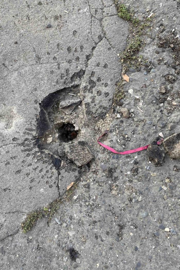 distinctive pattern of a M095 dual-purpose submunition impact