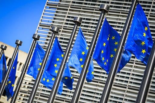 European Union flags are waving in front of the headquarters of the European Commission in Brussels. August 5, 2020. 