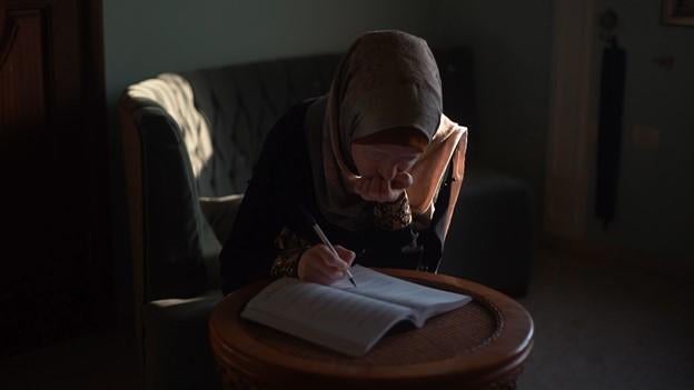 Eman AbuJarad, a 21-year-old woman with low vision, tries to study during a power outage in Gaza . &ldquo;When electricity cuts off in evening hours and then comes back, it takes me an hour to regain my sight,&rdquo; she told Human Rights Watch. 