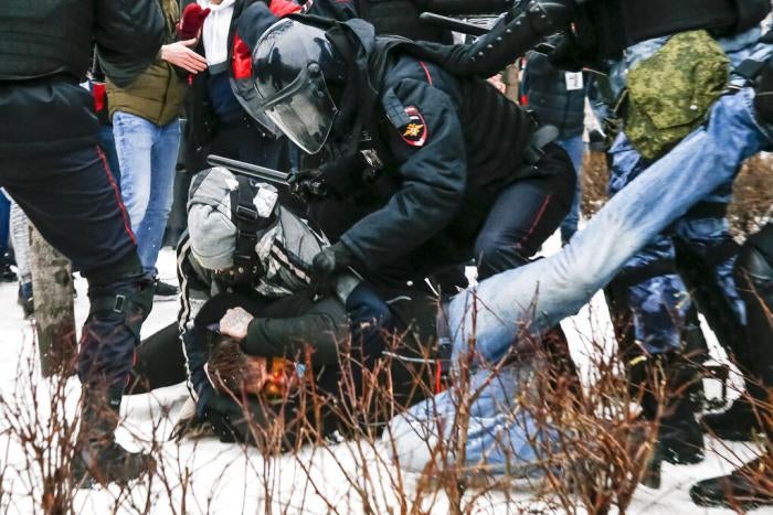 Riot police detain a demonstrator with a bloody face during a protest against the jailing of opposition leader Alexei Navalny in Pushkin Square, Moscow, Russia, Saturday, January&nbsp;23, 2021.&nbsp;