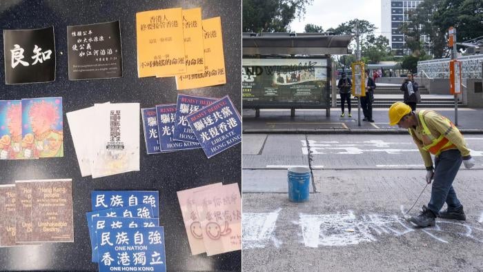 The police display leaflets and government workers paint over graffiti