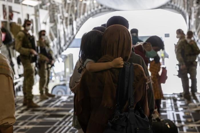 Afghanistan evacuees arrive at Australia&rsquo;s main operating base in the Middle East