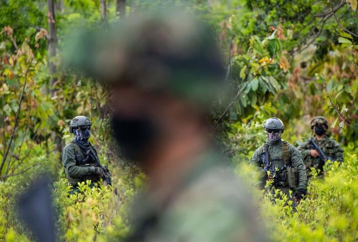 Colombian police officers during an operation in December 2020 to eradicate illicit crops in Tumaco, Nari&ntilde;o state, Colombia. Over three years earlier, in October 2017, seven civilians protesting eradication operations were killed in the same state.