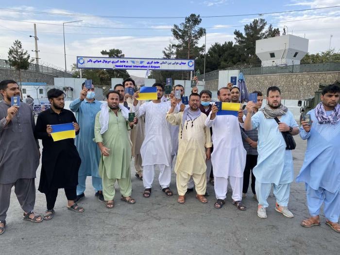 Ukrainian citizens gathered outside Hamid Karzai International airport in early September 2021 asking Ukraine to evacuate them, Kabul Afghanistan.