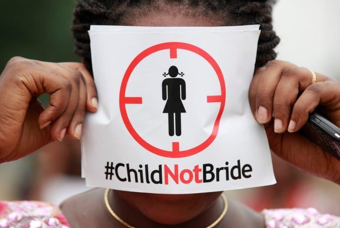 A woman protests against underage marriage, Lagos, Nigeria. 