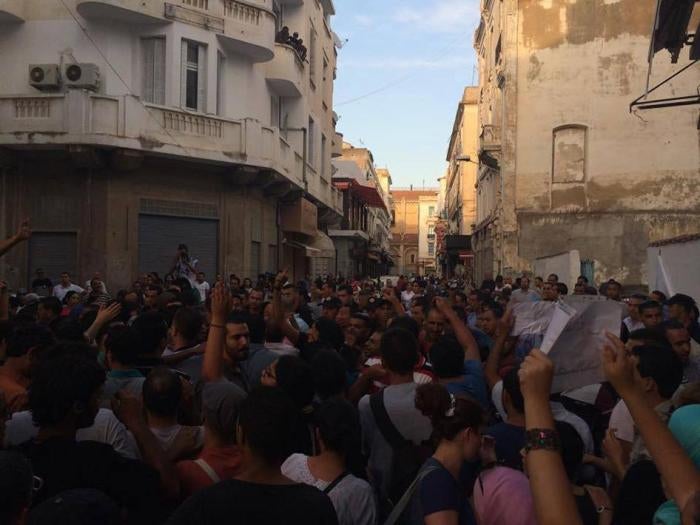 Demonstrators gathered in Mohamed Ali square, near the headquarters of the Tunisian Labor Union in downtown Tunis, protesting the economic reconciliation bill, on September 1, 2015. © 2015 Issam Heni