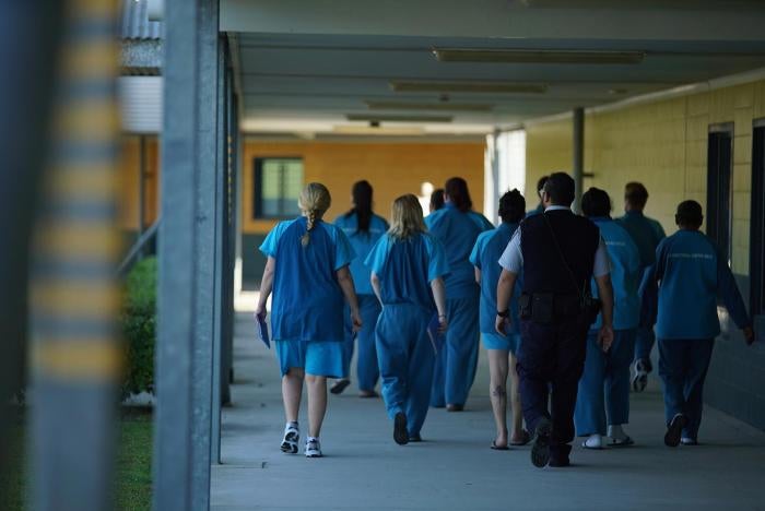 Female prisoners walking in the Brisbane Women&rsquo;s Correctional Centre, Queensland. 