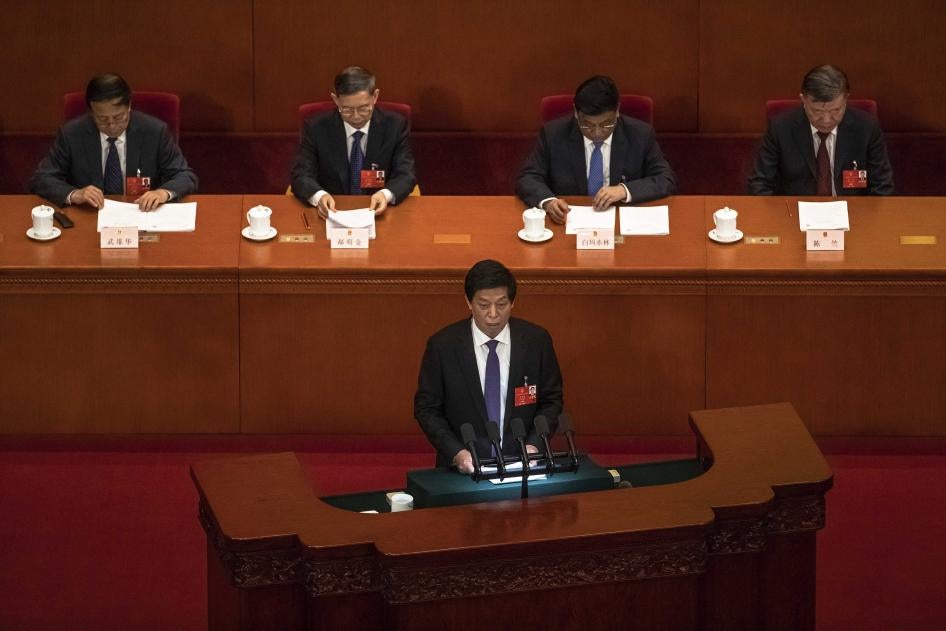Li Zhanshu, président du Comité permanent de l'Assemblée nationale populaire (ANP) chinoise, prononce un discours au Grand Palais du Peuple à Pékin, le 25 mai 2020. 