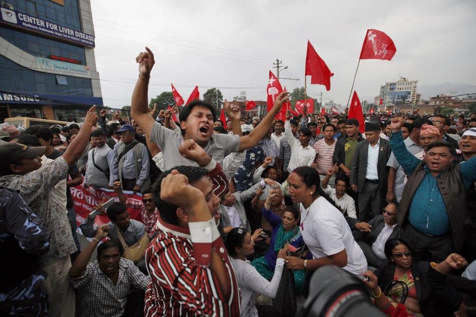 Nepalese activists of the Dalit community, also known as the untouchables, shout slogans during a protest near the Nepalese Constituent Assembly Hall in Kathmandu, Nepal, Wednesday, Aug. 5, 2015.  © 2015 AP Photo/Niranjan Shrestha