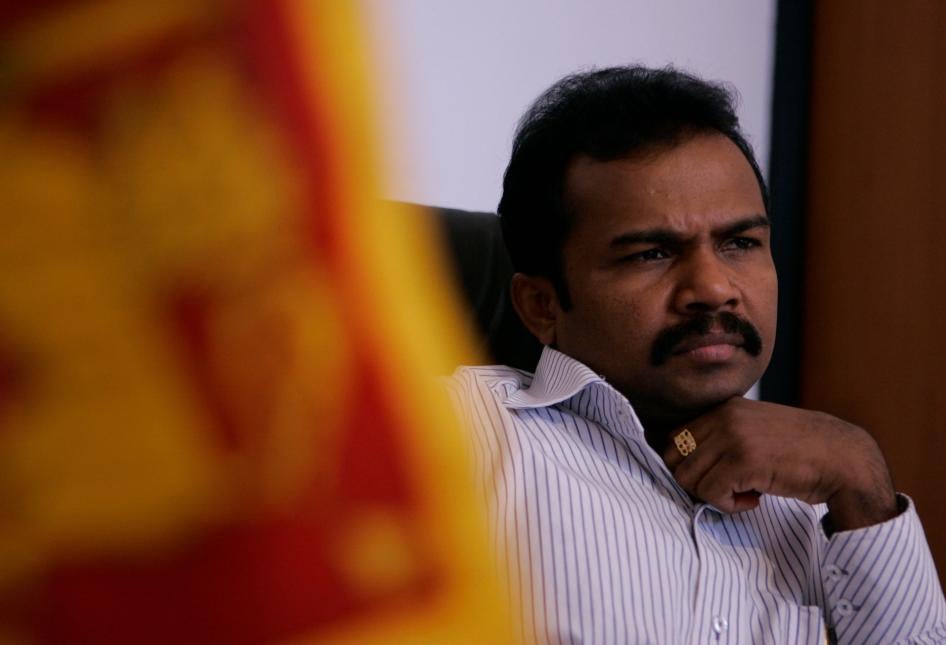 Former LTTE commander and armed group leader Vinayagamoorthi Muralitharan, known as Karuna Amman, speaks to the media  at his office in Colombo as minister for national integration in the Sri Lankan government, May 2009.