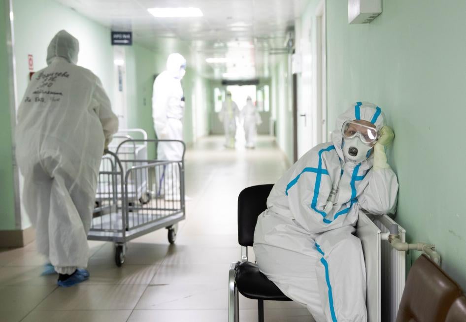 A medical specialist wearing personal protective equipment (PPE) takes a break at the City Clinical Hospital Number 15 which delivers treatment to COVID-19 patients in Moscow, Russia May 25, 2020.