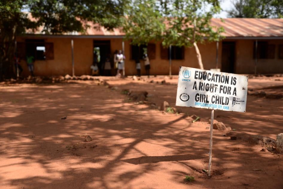 This file photo shows a sign reading "Education is a right for a girl child" at a refugee settlement of people from South Sudan in Imvepi, Uganda, 27 June 2017.