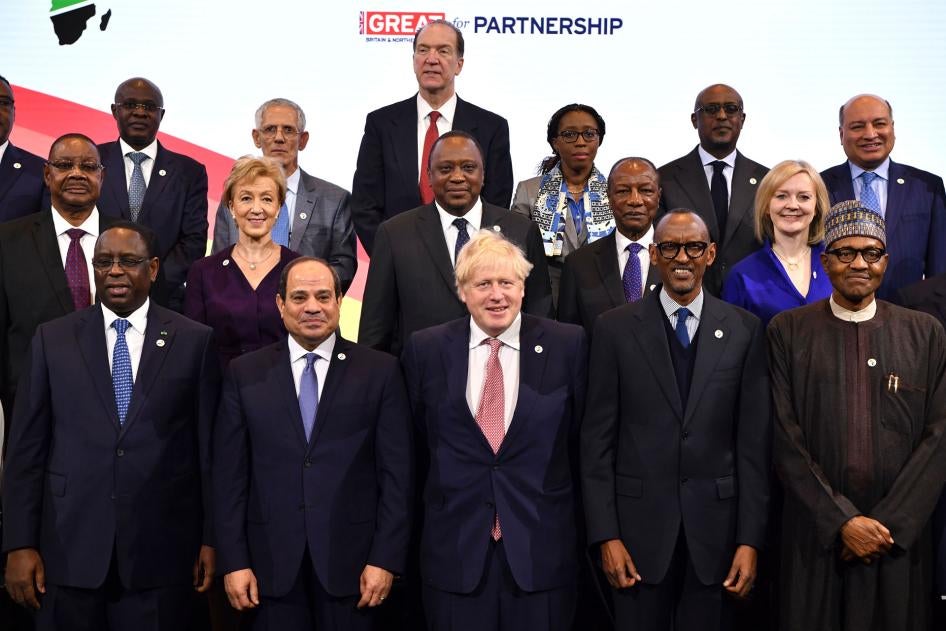 United Kingdom Prime Minister Boris Johnson (front row, center) poses for a photo with African state leaders and international officials at the UK-Africa Investment Summit in London, January 20, 2020. 