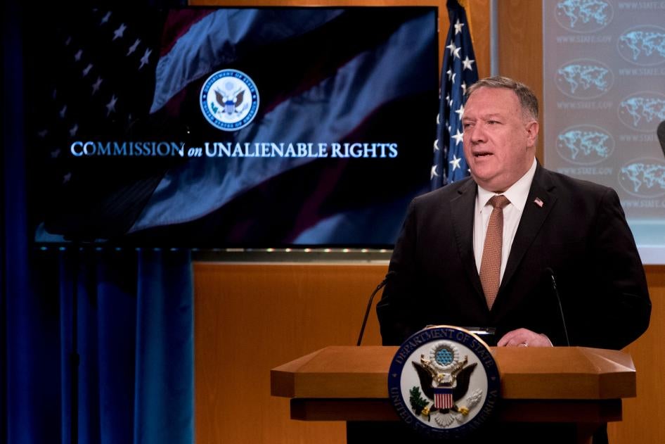 A monitor displays the words "Commission on Unalienable Rights" behind Secretary of State Mike Pompeo as he speaks during a news conference at the State Department in Washington, July 15, 2020.