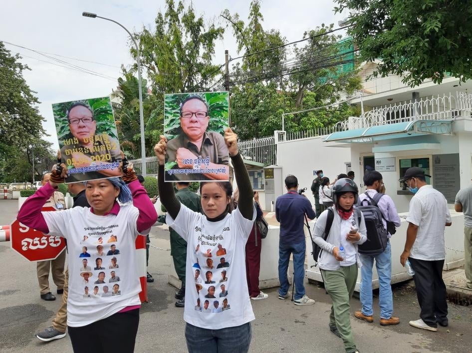 Family members of detained opposition activists hand in a petition calling for the British Embassy to ​speak out on human rights in Cambodia, July 24, 2020. 