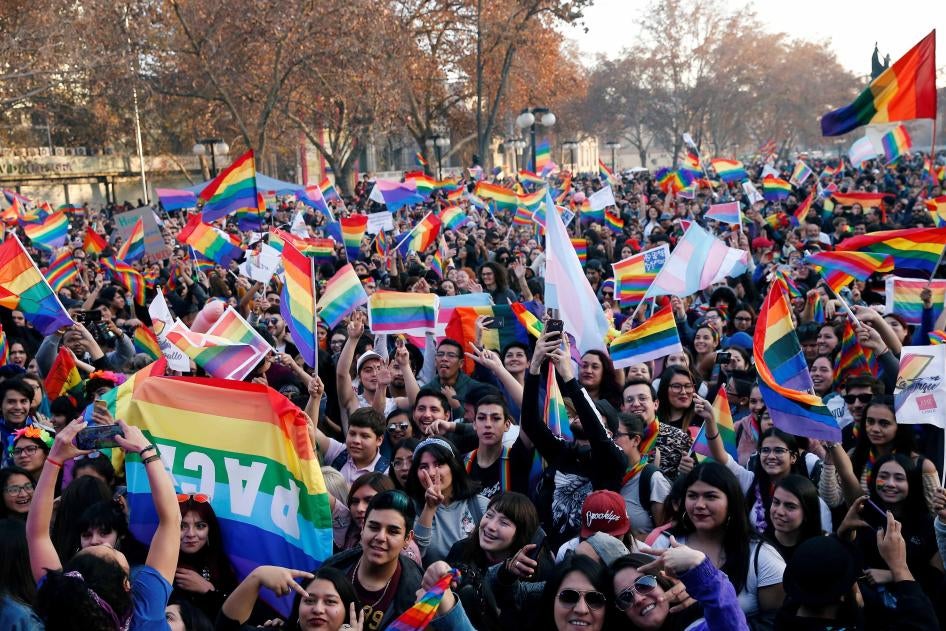 People take part in the annual Pride parade in support of the LGBT community, in Santiago, Chile, on June 22, 2019.