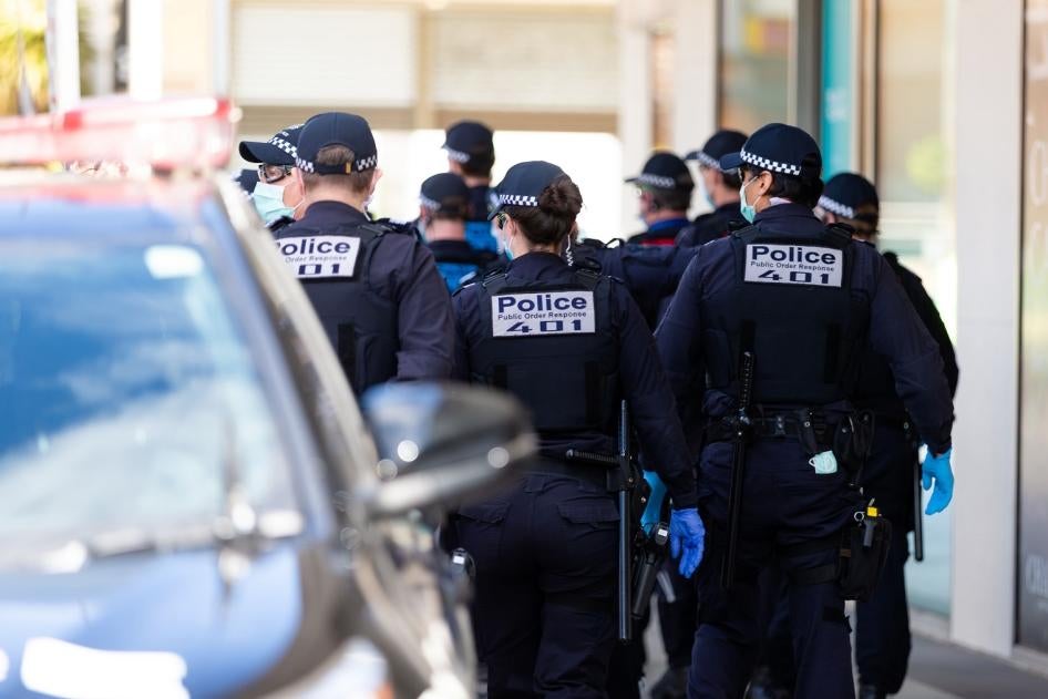 Police Public Order Response Teams respond to a small group of protesters who appeared at a shopping center and quickly dispersed before any arrests could be made during pop-up protests on September 20, 2020 in Melbourne, Australia. 