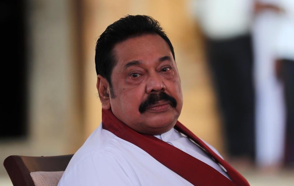 Sri Lanka’s former President Mahinda Rajapaksa, waits to be sworn in as prime minister at Kelaniya Royal Buddhist temple in Colombo, Sri Lanka, August 9, 2020.