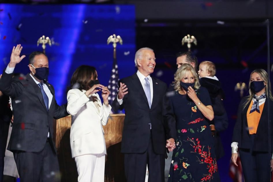 Biden with Kamala Harris. Indoors. People Standing.